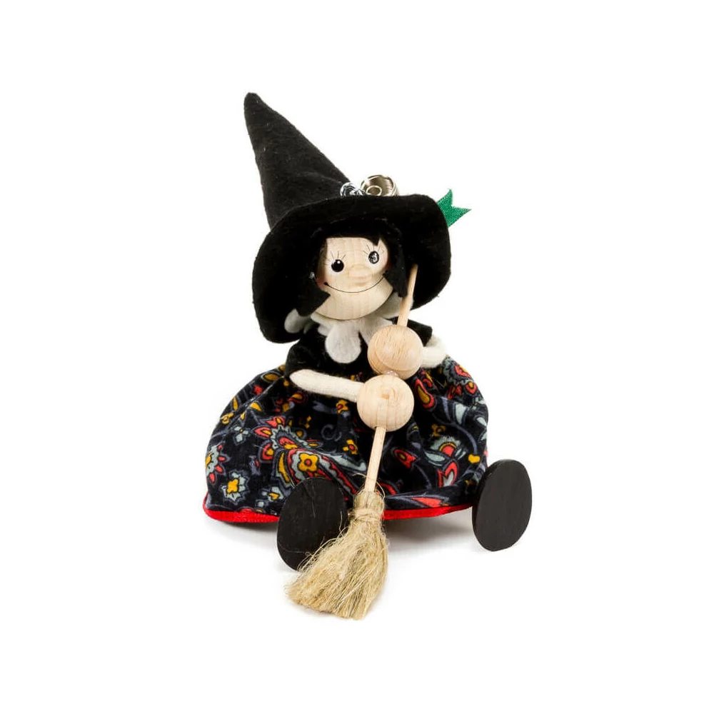 Rugós figura (boszi, fekete kalappal, fekete ruhában)