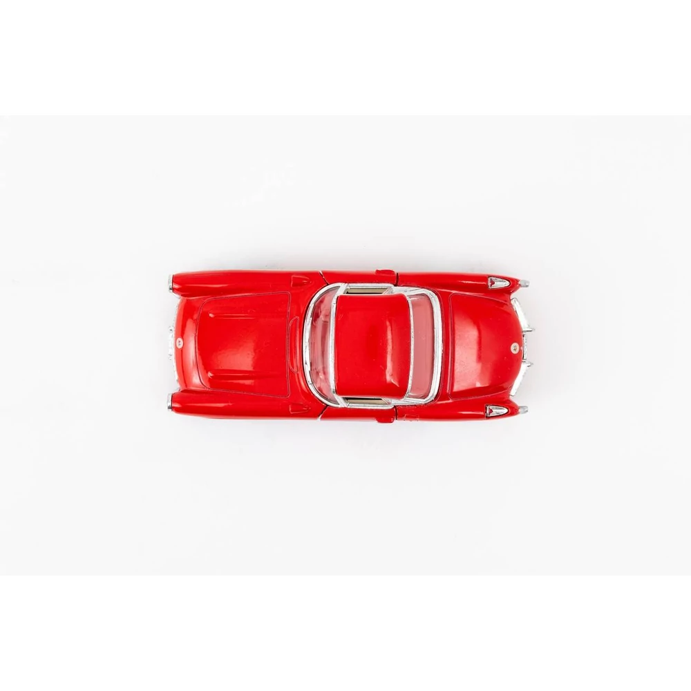 Kinsmart Chevrolet Corvette 1957 fém autó nyitható ajtókkal 1:34 (többféle)